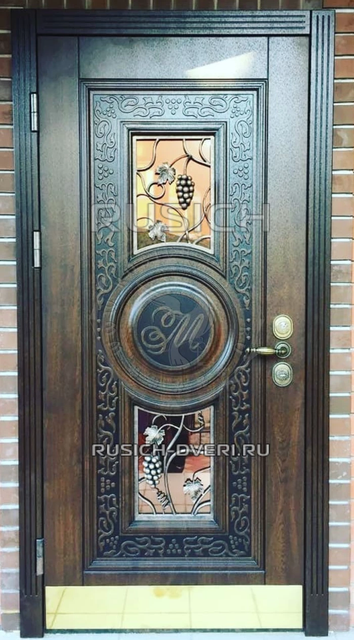 Наружная металлическая дверь со стеклом и ковкой ЭДМ-720 фото 1